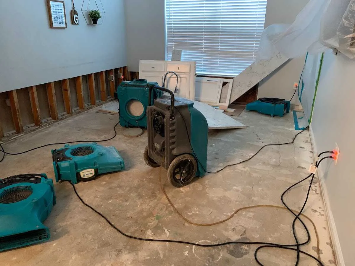 Dehumidifier in flood-cut room for Water Damage Restoration in Alpharetta